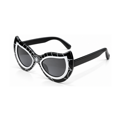 Black and white cat-eye sunglasses with a spiderweb pattern on the front, dark gray lenses, and black temples, shown on a clean white background.