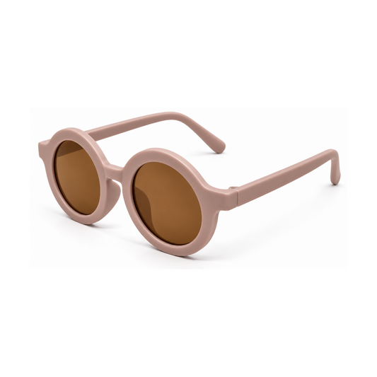 Round sunglasses with a matte dusty pink frame and warm brown lenses, shown on a clean white background.